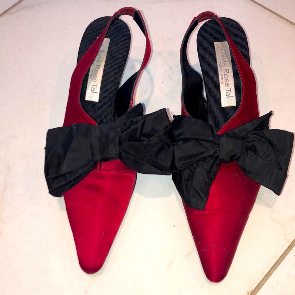 Olivia Rose Tal Red heels with black bow. Used but Great condition!Size 7.